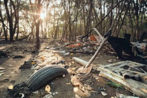 restoration - Plastic waste and debris scattered on a sandy seashore in Costa Del Este, Panama, highlighting the need for env